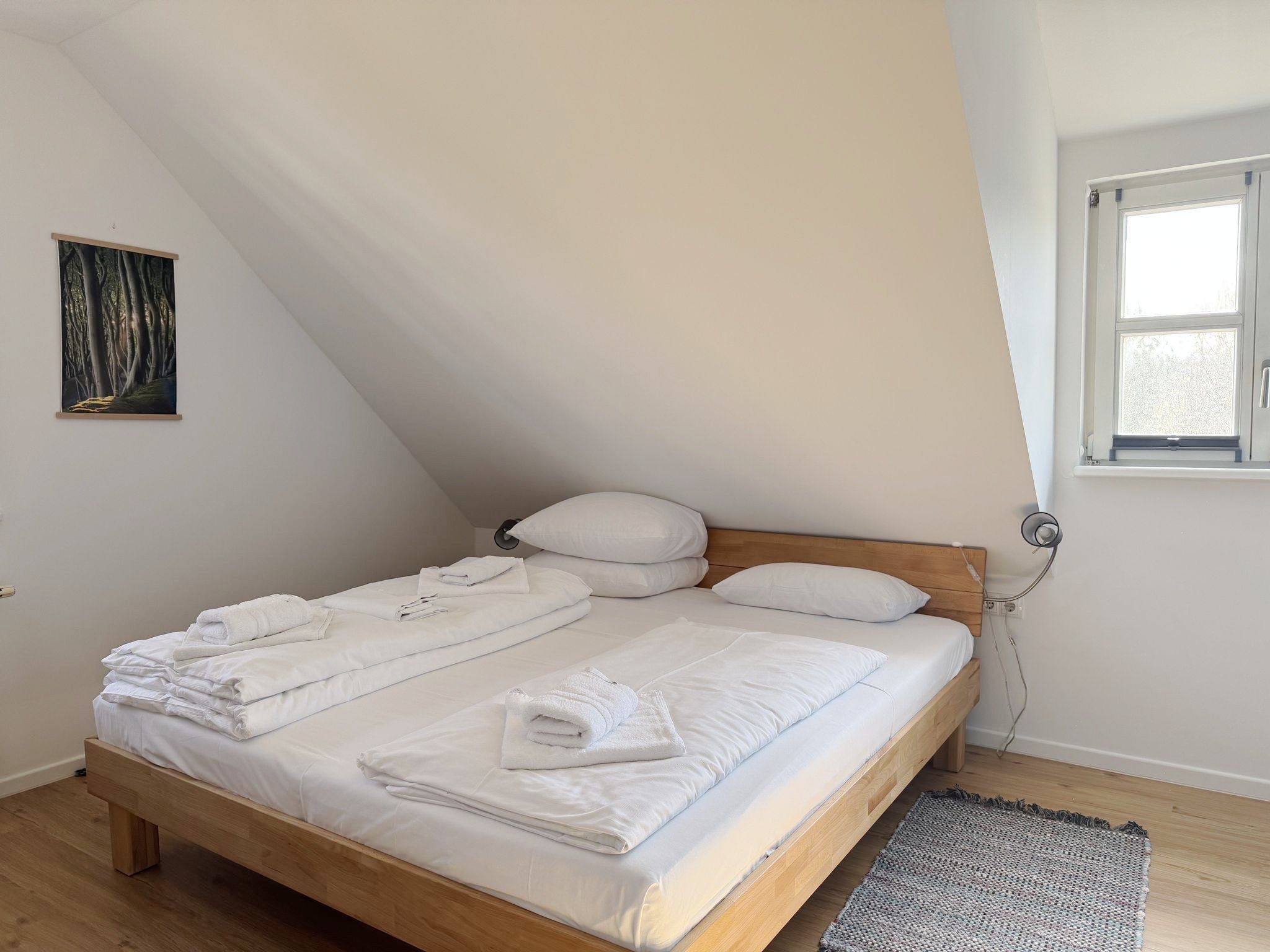 Feriendorf Rugana Komfortplus Ferienwohnung mit 2 Schlafzimmern und Terrasse (A06) Insel Rügen - Schlafzimmer