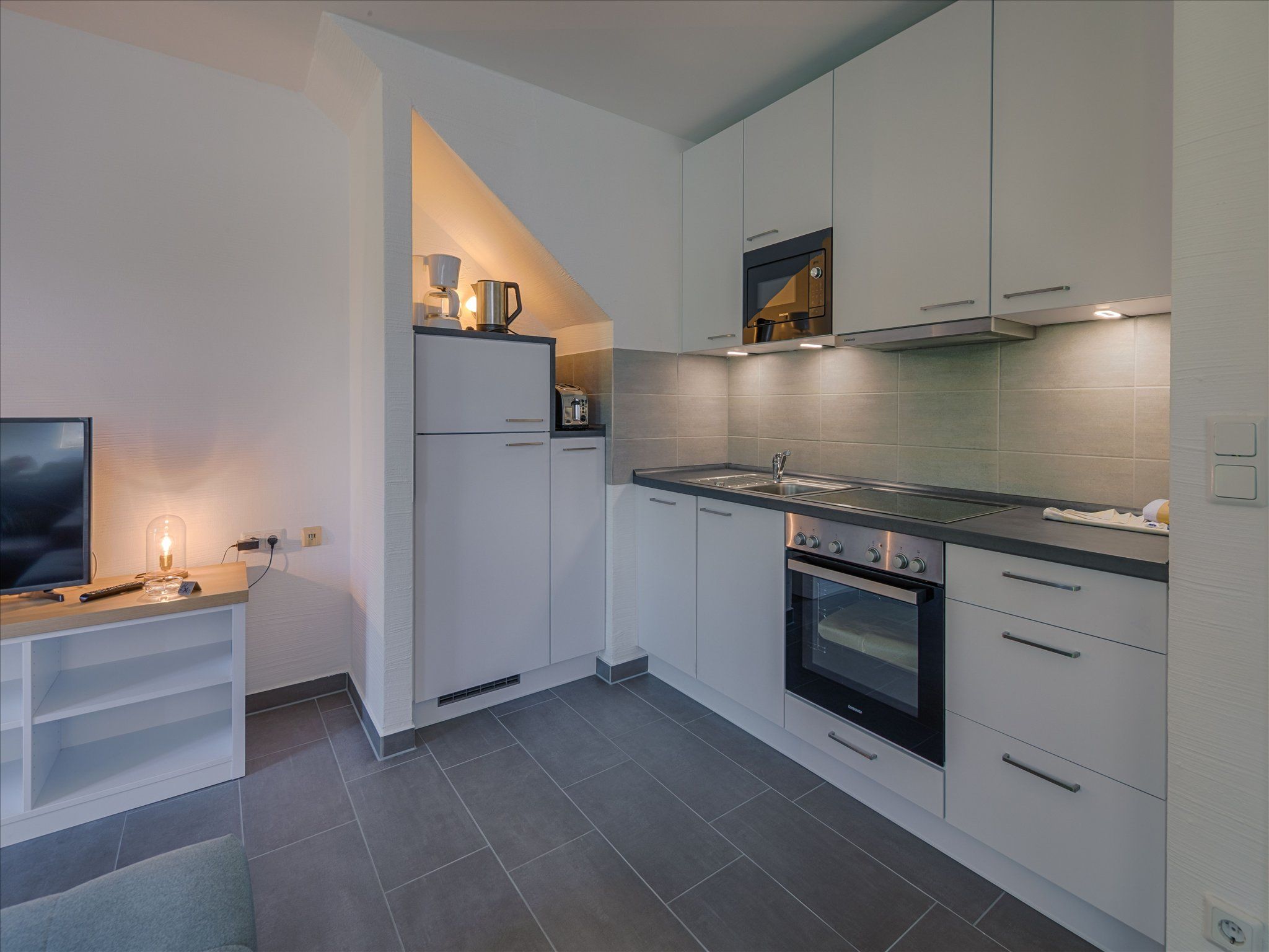 Feriendorf Rugana Komfort Ferienwohnung mit 1 Schlafzimmer und Terrasse (A55) Insel Rügen - Küche / Küchenzeile