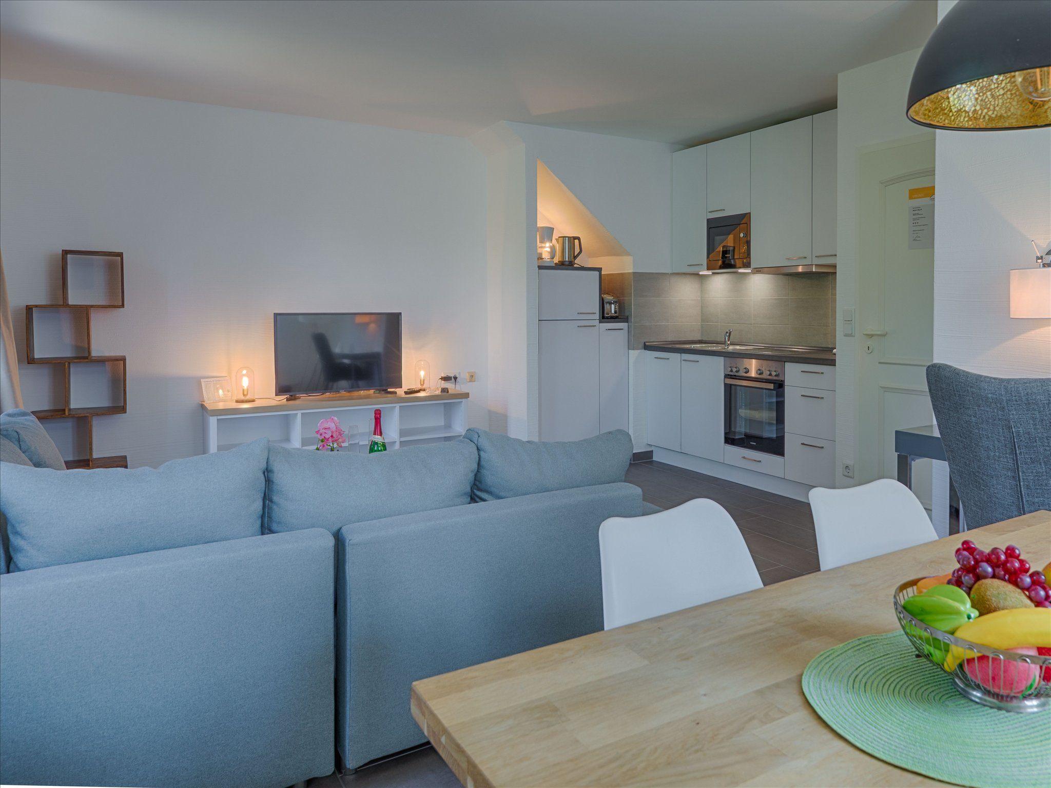 Feriendorf Rugana Komfort Ferienwohnung mit 1 Schlafzimmer und Terrasse (A55) Insel Rügen - Wohnzimmer