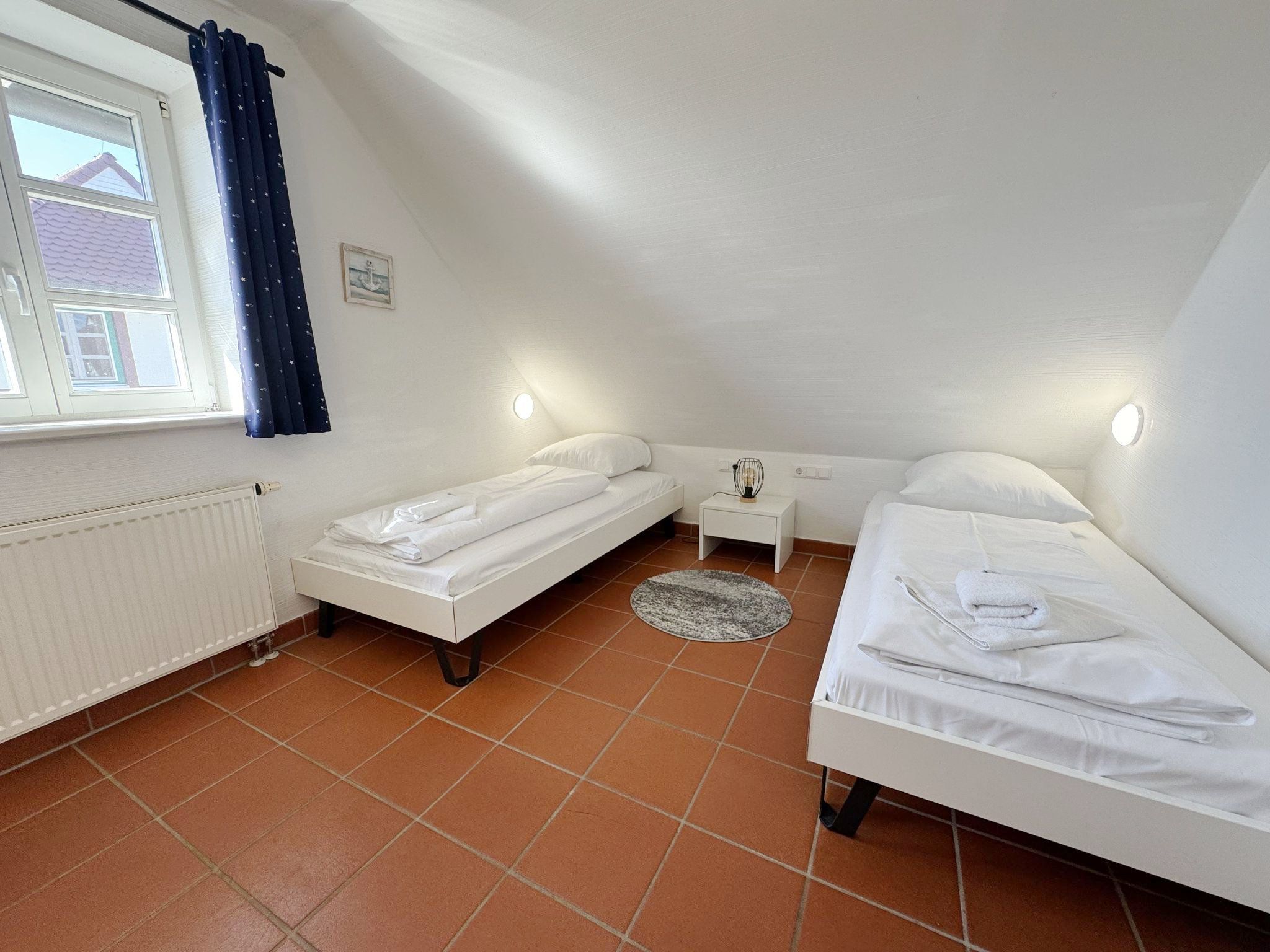 Feriendorf Rugana Komfort Ferienwohnung mit 2 Schlafzimmern und Terrasse (C05) Insel Rügen - Schlafzimmer
