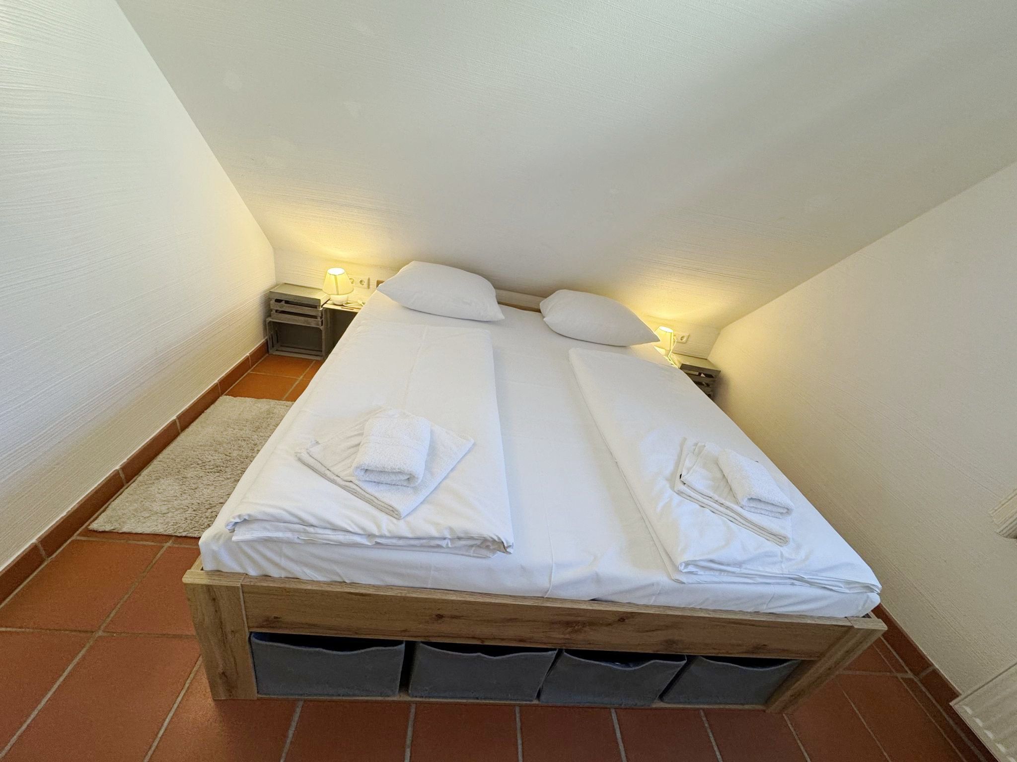 Feriendorf Rugana Komfort Ferienwohnung mit 1 Schlafzimmer (D49) Insel Rügen - Schlafzimmer