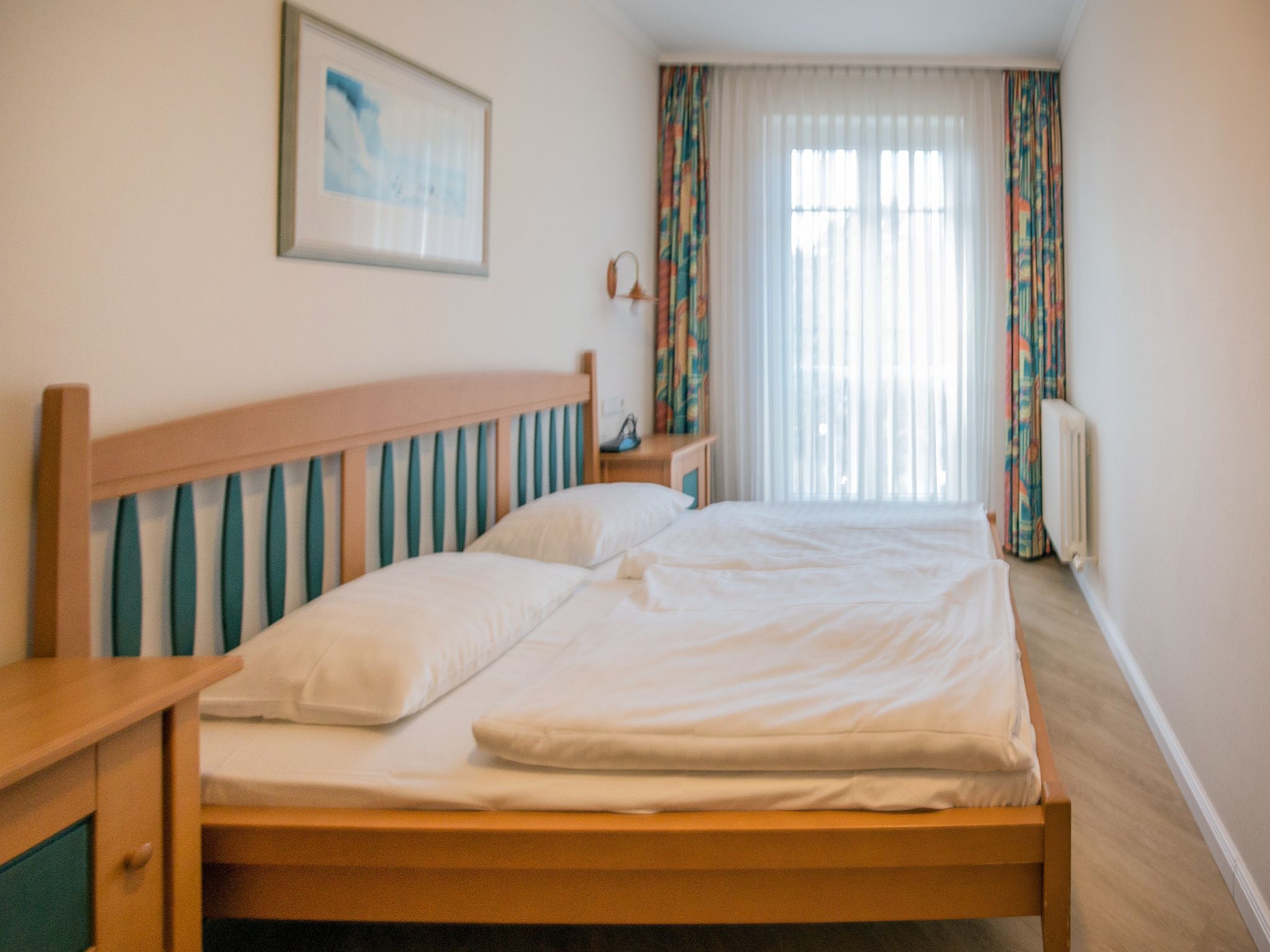 Dünenpark Binz Komfortplus Ferienwohnung mit 1 Schlafzimmer und Balkon im Dachgeschoss (010) Insel Rügen - Schlafzimmer