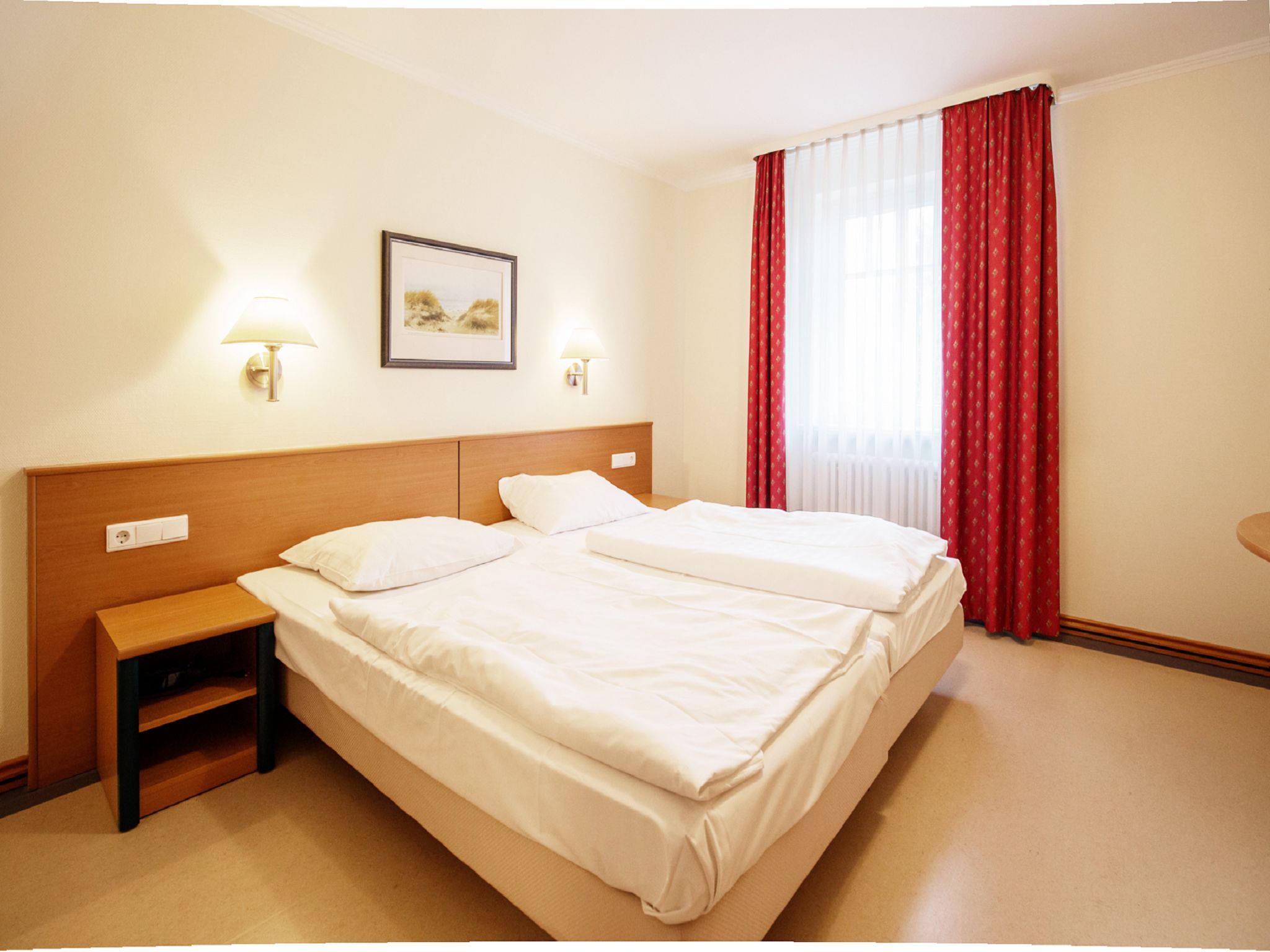 Dünenpark Binz Komfort Ferienwohnung mit 1 Schlafzimmer und Balkon im Obergeschoss (019) Insel Rügen - Schlafzimmer