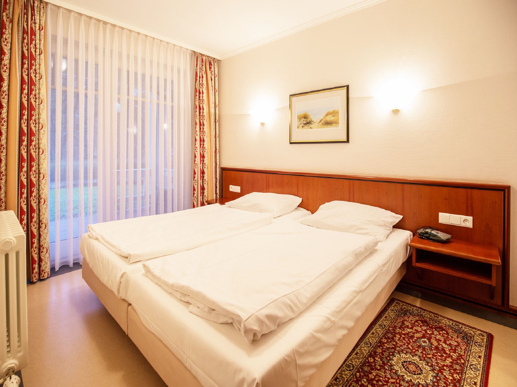 Dünenpark Binz Komfort Ferienwohnung mit 1 Schlafzimmer und Terrasse im Erdgeschoss (034) Insel Rügen - Schlafzimmer