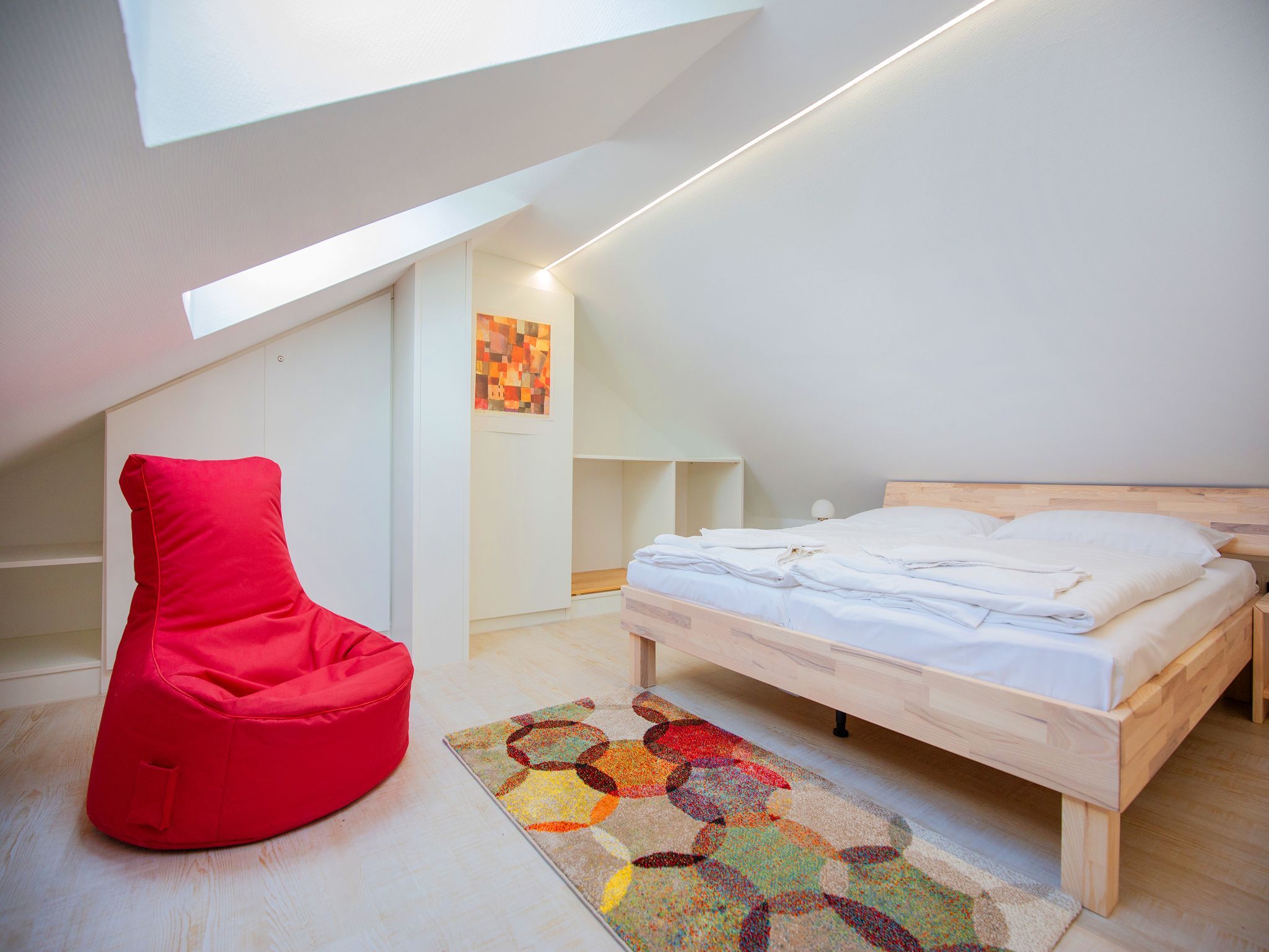 Dünenpark Binz Komfortplus Ferienwohnung mit 1 Schlafzimmer und Balkon im Dachgeschoss (114) Insel Rügen - Schlafzimmer