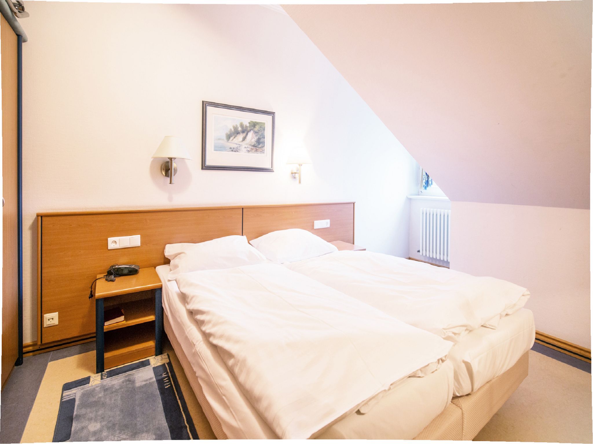 Dünenpark Binz Komfort Ferienwohnung mit 1 Schlafzimmer und Balkon im Dachgeschoss (161) Insel Rügen - Schlafzimmer