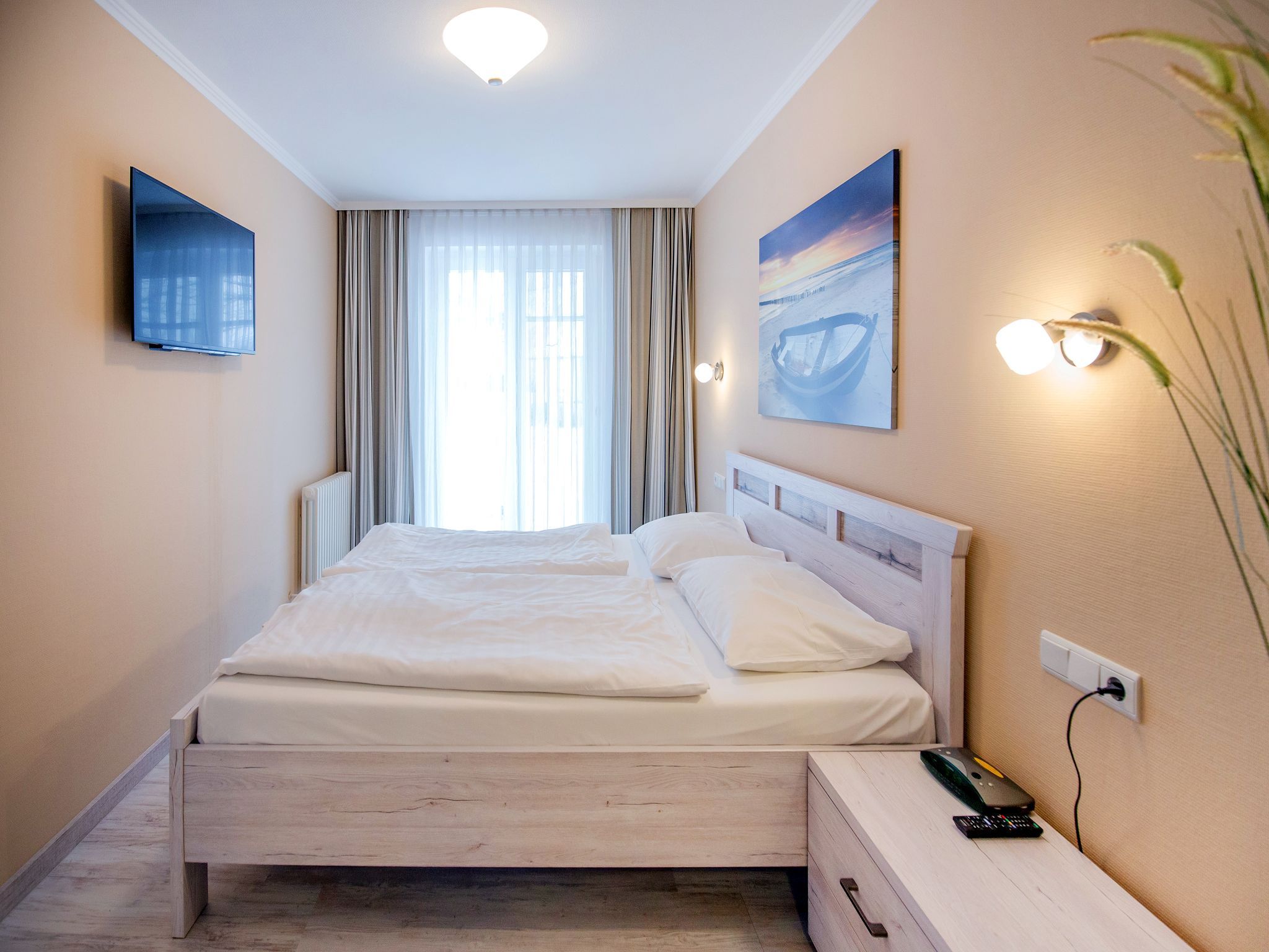 Dünenpark Binz Komfortplus Ferienwohnung mit 1 Schlafzimmer und Terrasse im Erdgeschoss (165) Insel Rügen - Schlafzimmer