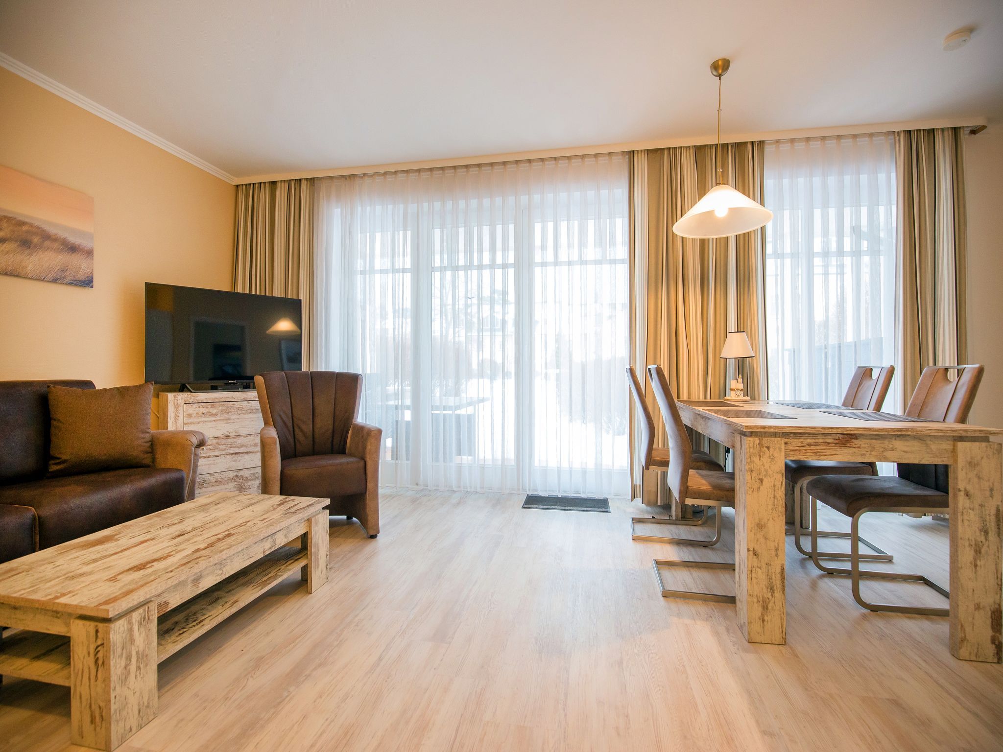 Dünenpark Binz Komfortplus Ferienwohnung mit 1 Schlafzimmer und Terrasse im Erdgeschoss (165) Insel Rügen - Wohnzimmer