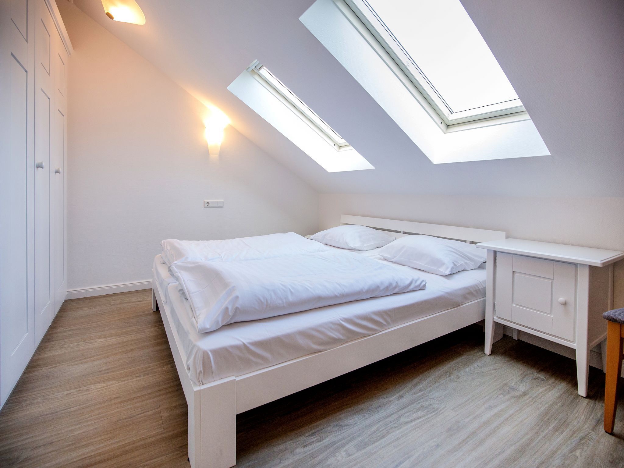 Dünenpark Binz Komfortplus Ferienwohnung mit 2 Schlafzimmern und Balkon im Dachgeschoss (171) Insel Rügen - Schlafzimmer