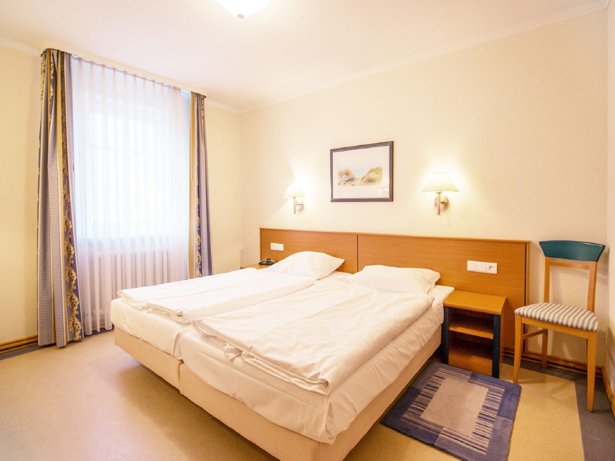 Dünenpark Binz Komfort Ferienwohnung mit 1 Schlafzimmer und Terrasse im Erdgeschoss (176) Insel Rügen - Schlafzimmer