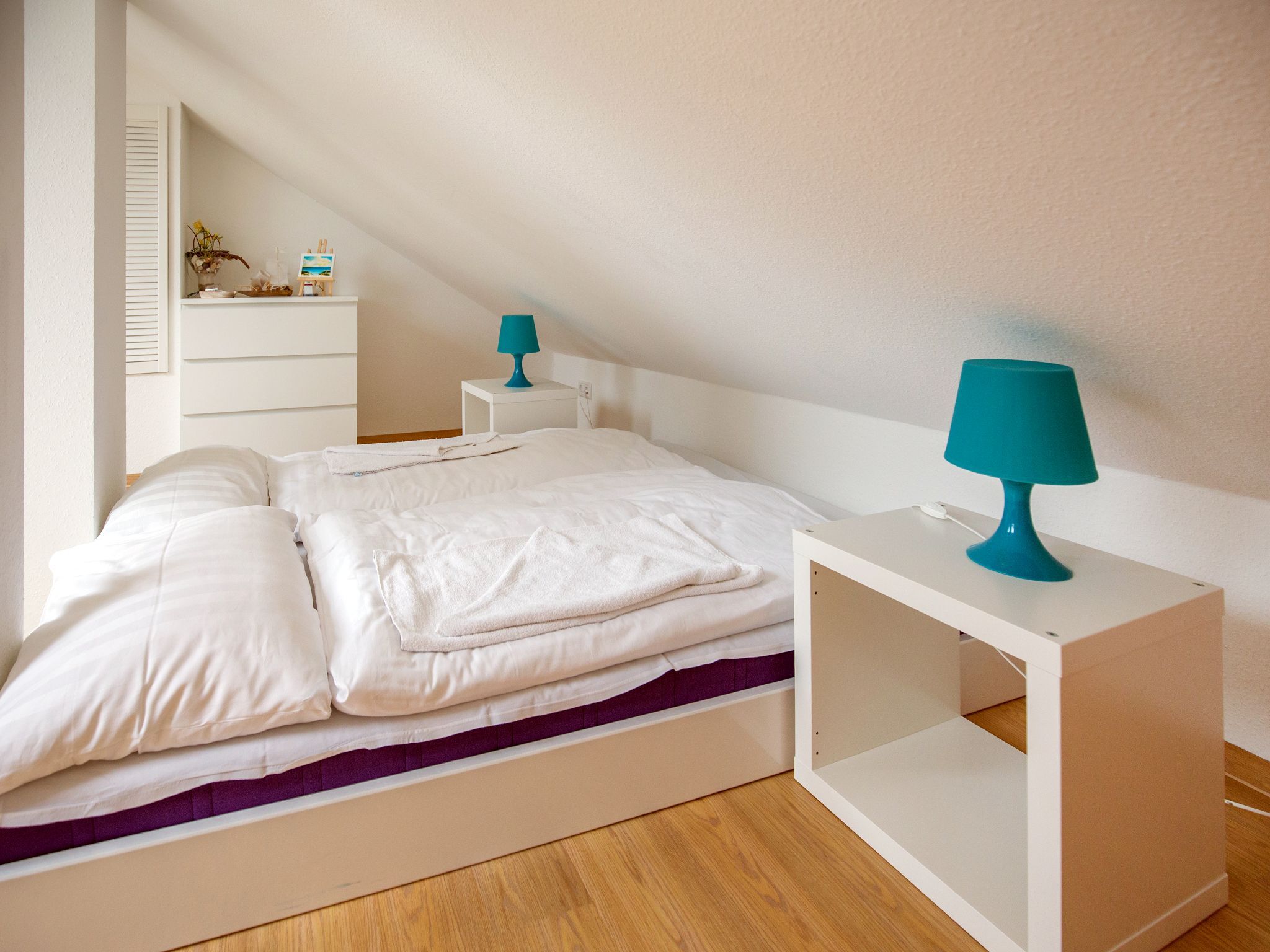 Dünenpark Binz Komfortplus Ferienwohnung mit 1 Schlafzimmer und Balkon im Dachgeschoss (209) Insel Rügen - Schlafzimmer