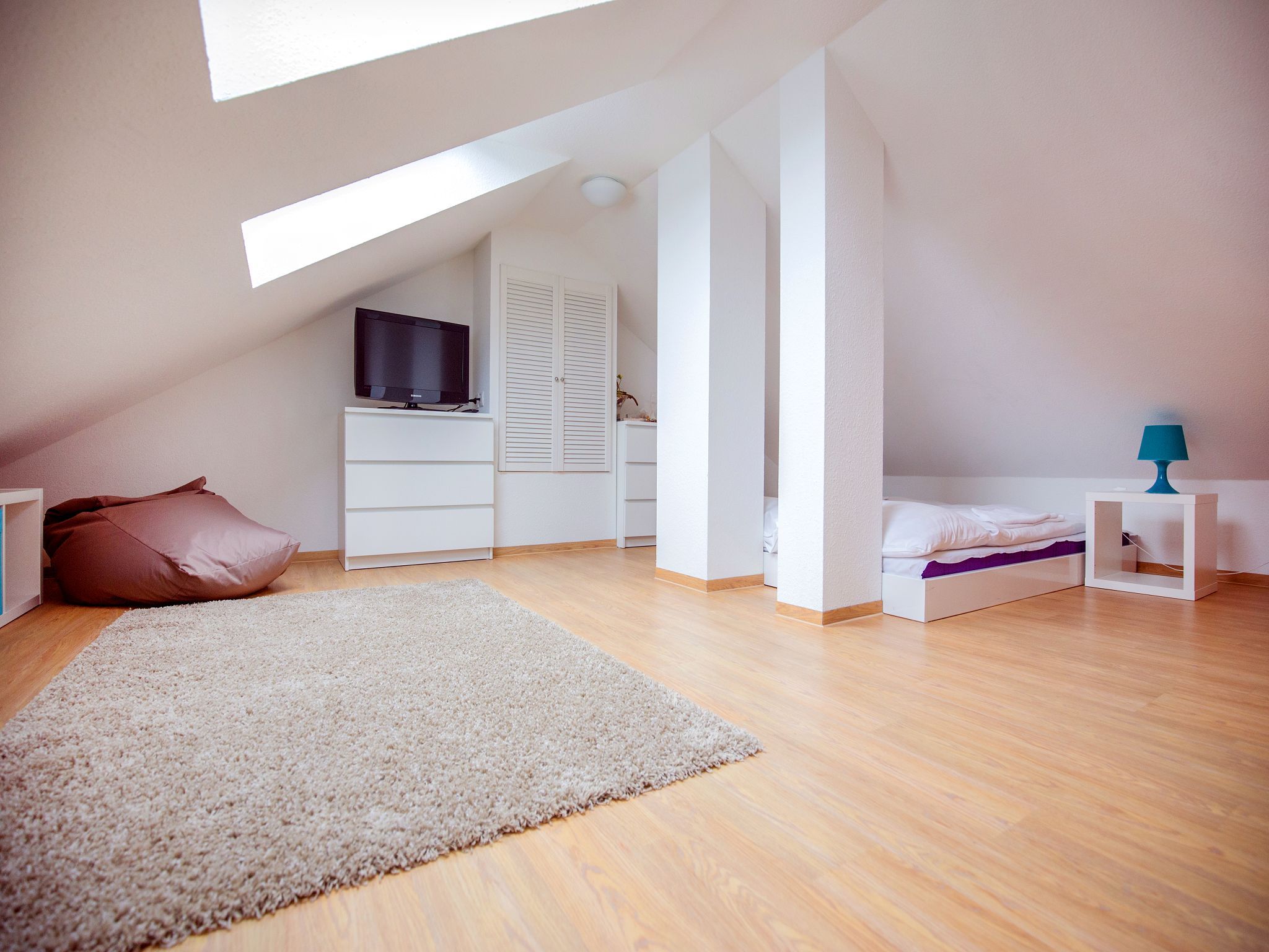 Dünenpark Binz Komfortplus Ferienwohnung mit 1 Schlafzimmer und Balkon im Dachgeschoss (209) Insel Rügen - Schlafzimmer