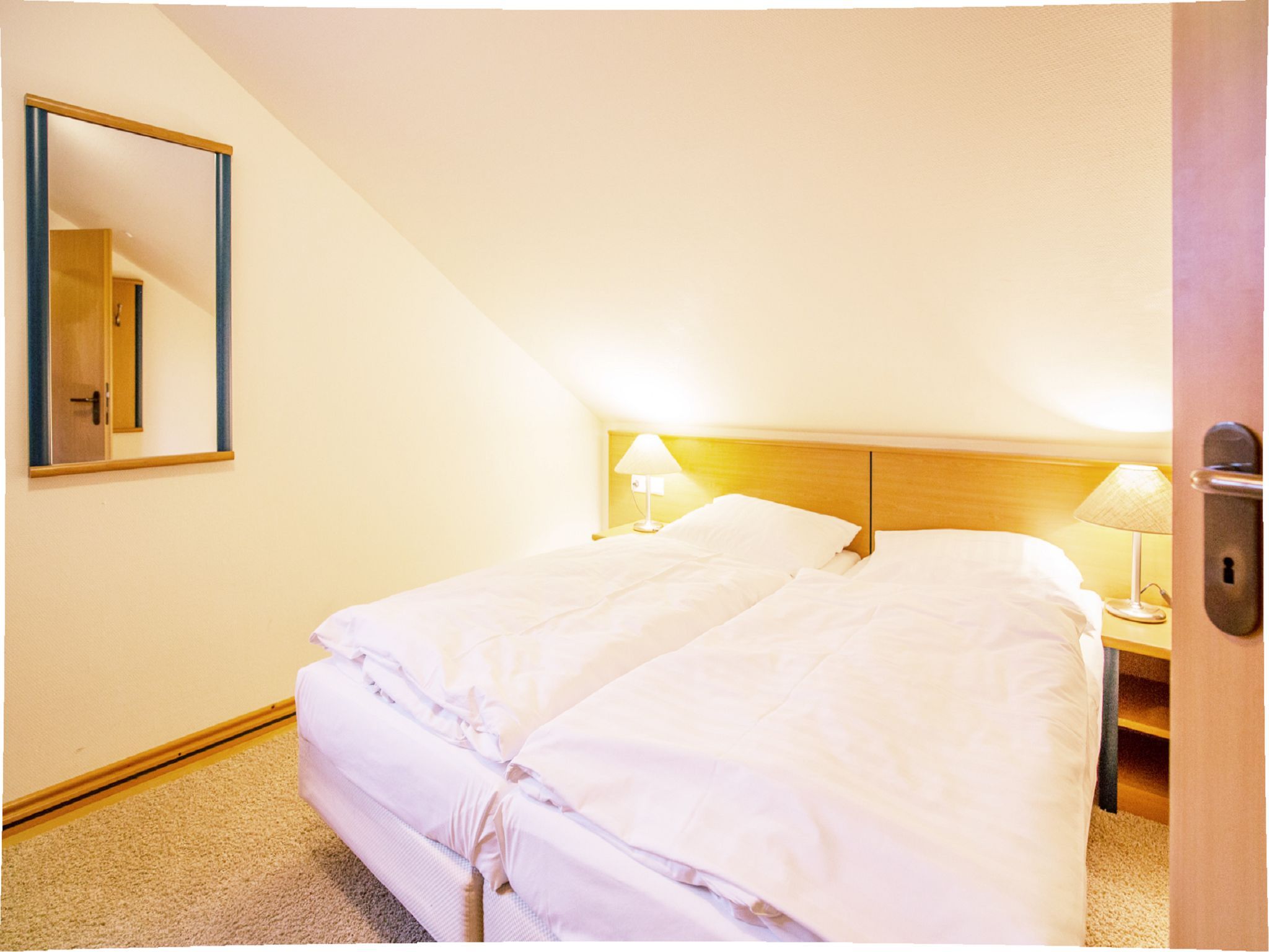 Dünenpark Binz Komfortplus Ferienwohnung mit 1 Schlafzimmern und Balkon im Dachgeschoss (303) Insel Rügen - Schlafzimmer