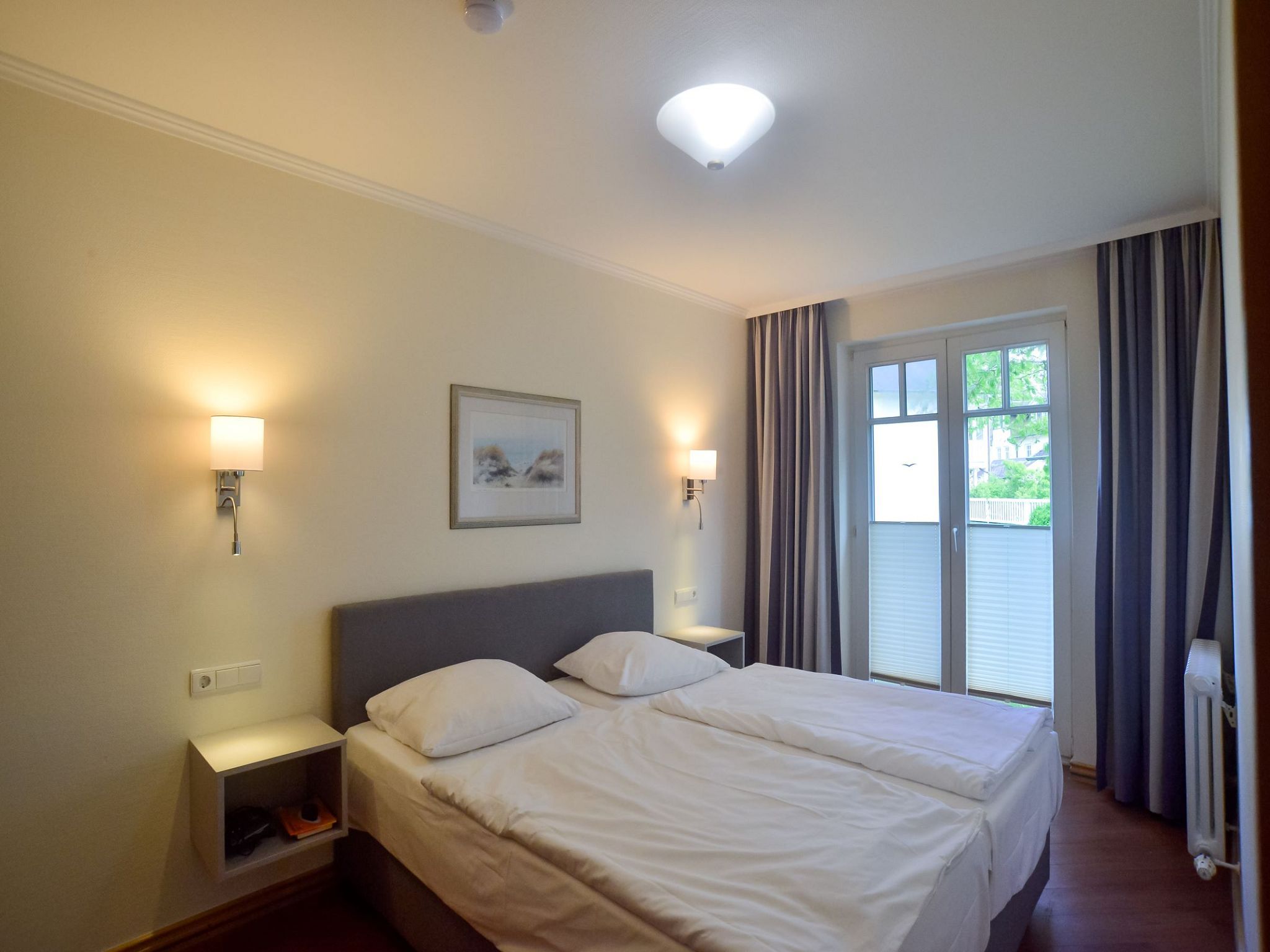 Dünenpark Binz Komfortplus Ferienwohnung mit 1 Schlafzimmer und Terrasse im Erdgeschoss (164) Insel Rügen - Schlafzimmer