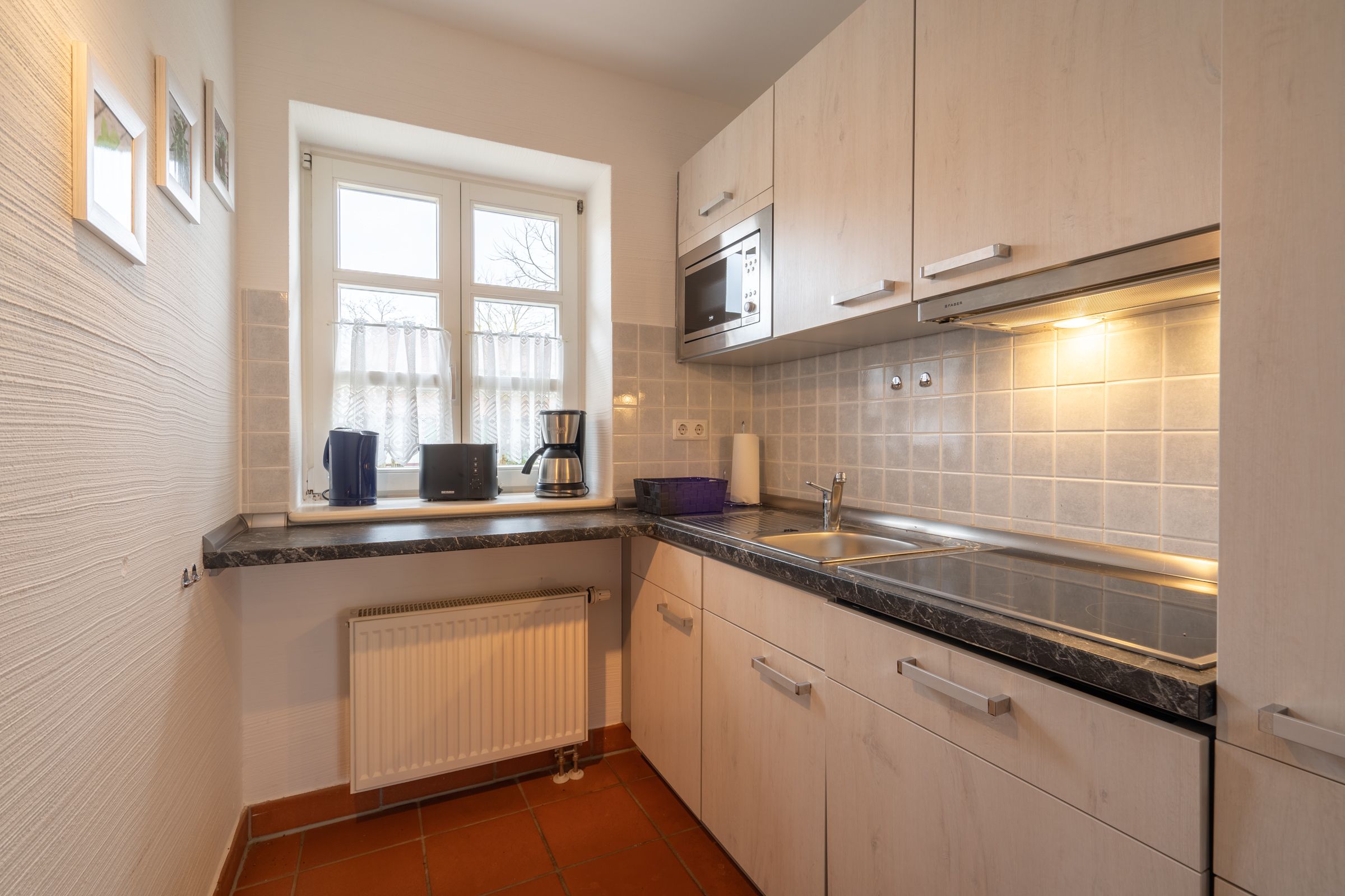 Feriendorf Rugana Komfort Ferienwohnung mit 2 Schlafzimmern und Terrasse (C29) Insel Rügen - Küche / Küchenzeile