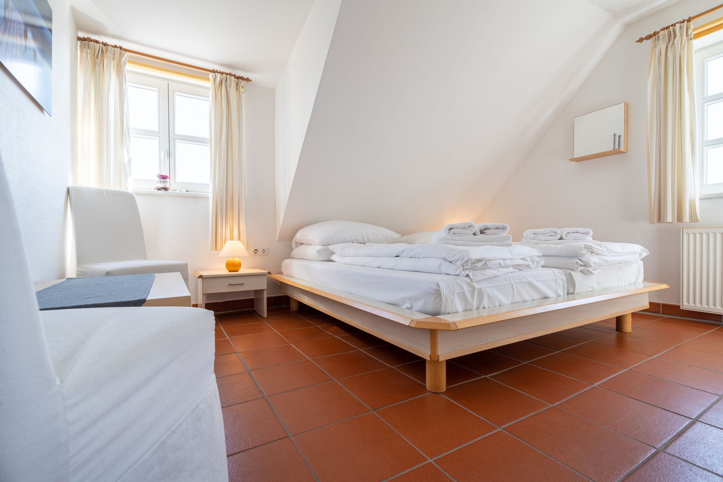 Feriendorf Rugana Komfort Ferienwohnung mit 2 Schlafzimmern und Terrasse (B01) Insel Rügen - Schlafzimmer