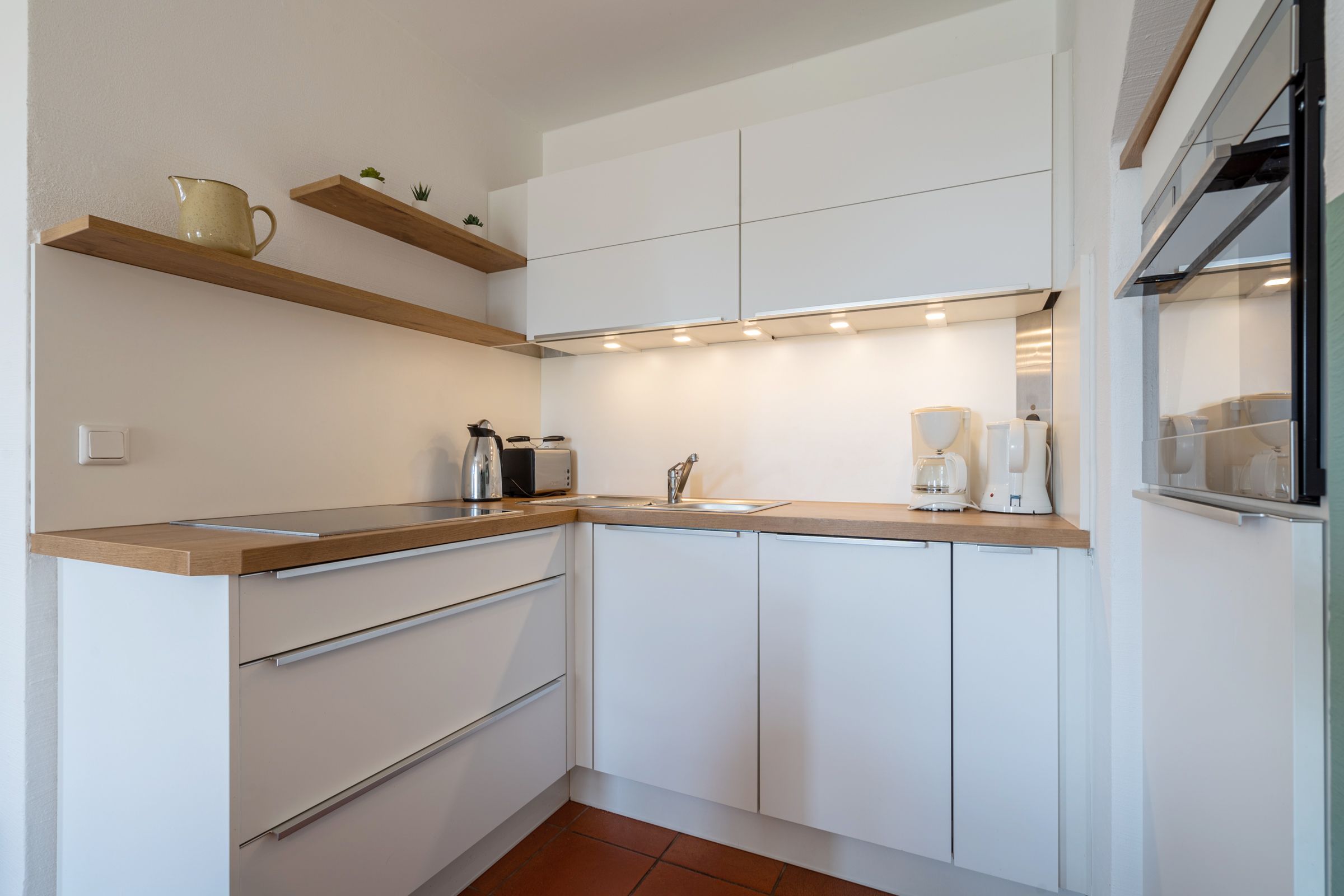 Feriendorf Rugana Komfortplus Ferienwohnung mit 1 Schlafzimmer und Terrasse (B02) Insel Rügen - Küche / Küchenzeile