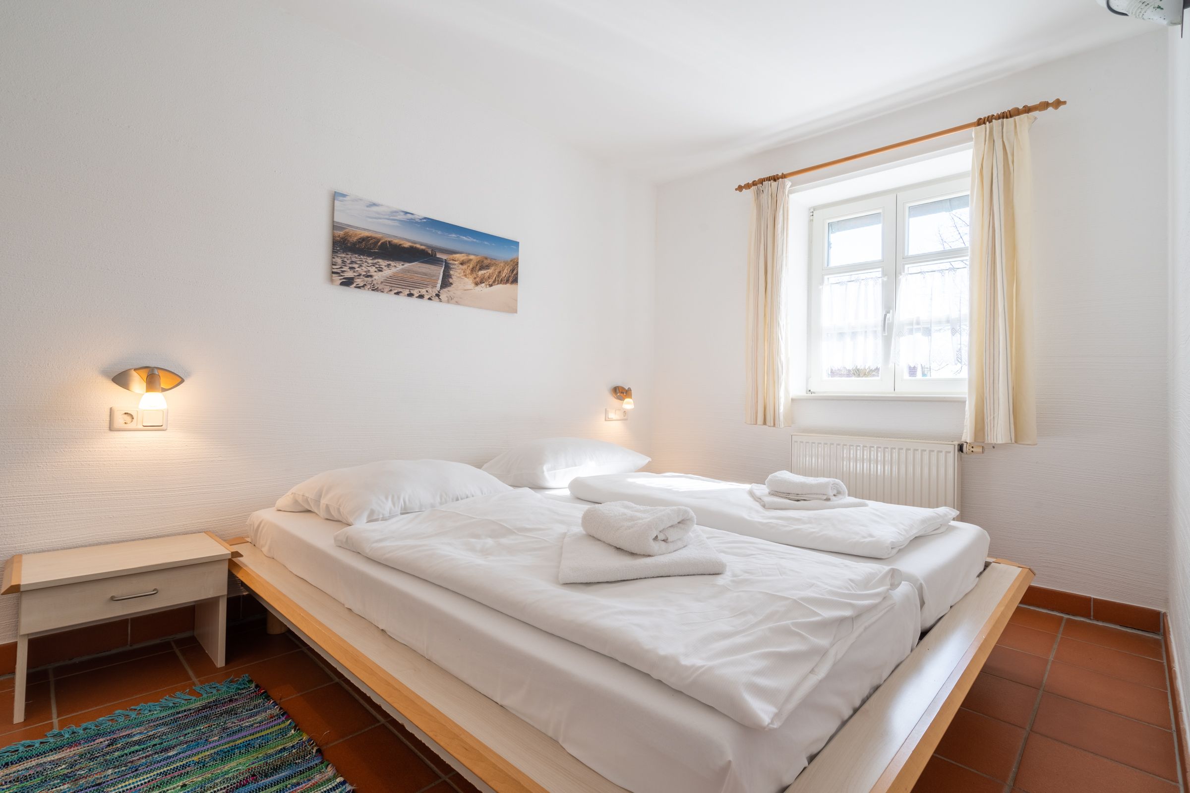 Feriendorf Rugana Komfortplus Ferienwohnung mit 1 Schlafzimmern und Terrasse (C39) Insel Rügen - Schlafzimmer