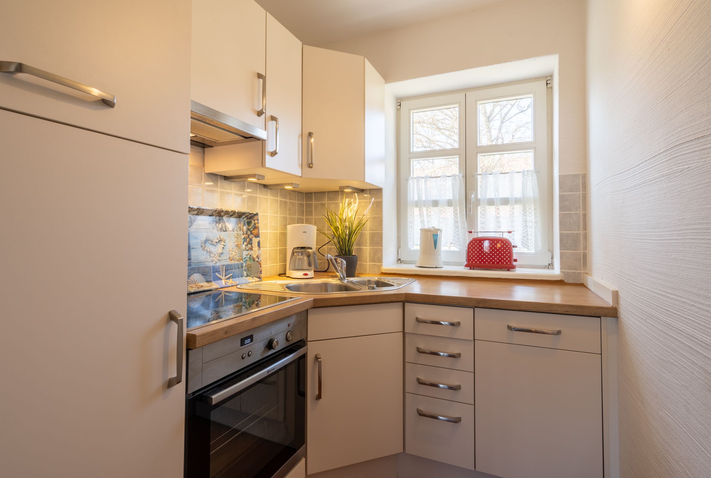 Feriendorf Rugana Klassik Ferienwohnung mit 2 Schlafzimmern und Terrasse (C53) Insel Rügen - Küche / Küchenzeile