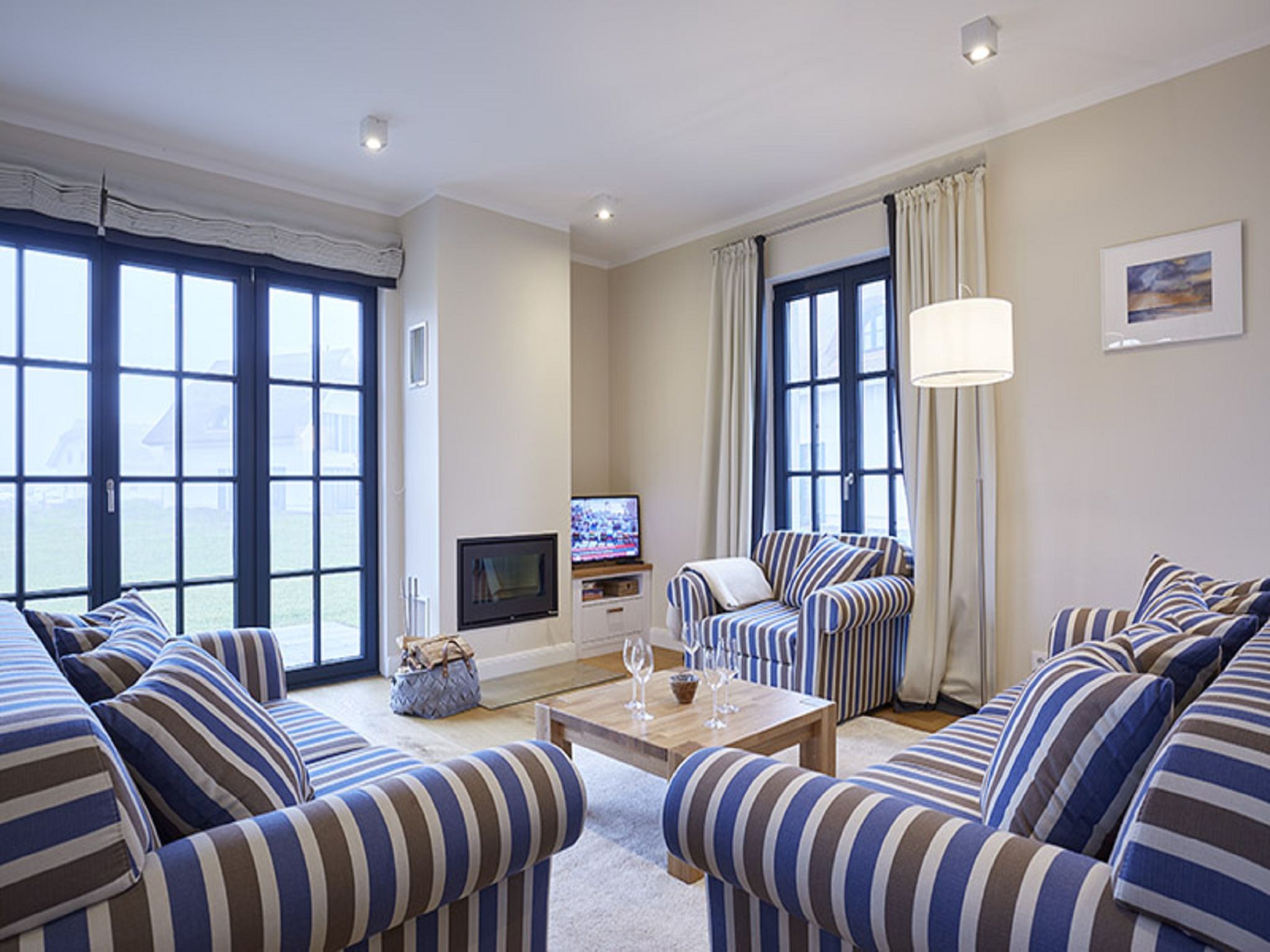 Luxus Reetdachvilla mit 3 Schlafzimmern, Sauna und Kamin (F15) - Wohnzimmer