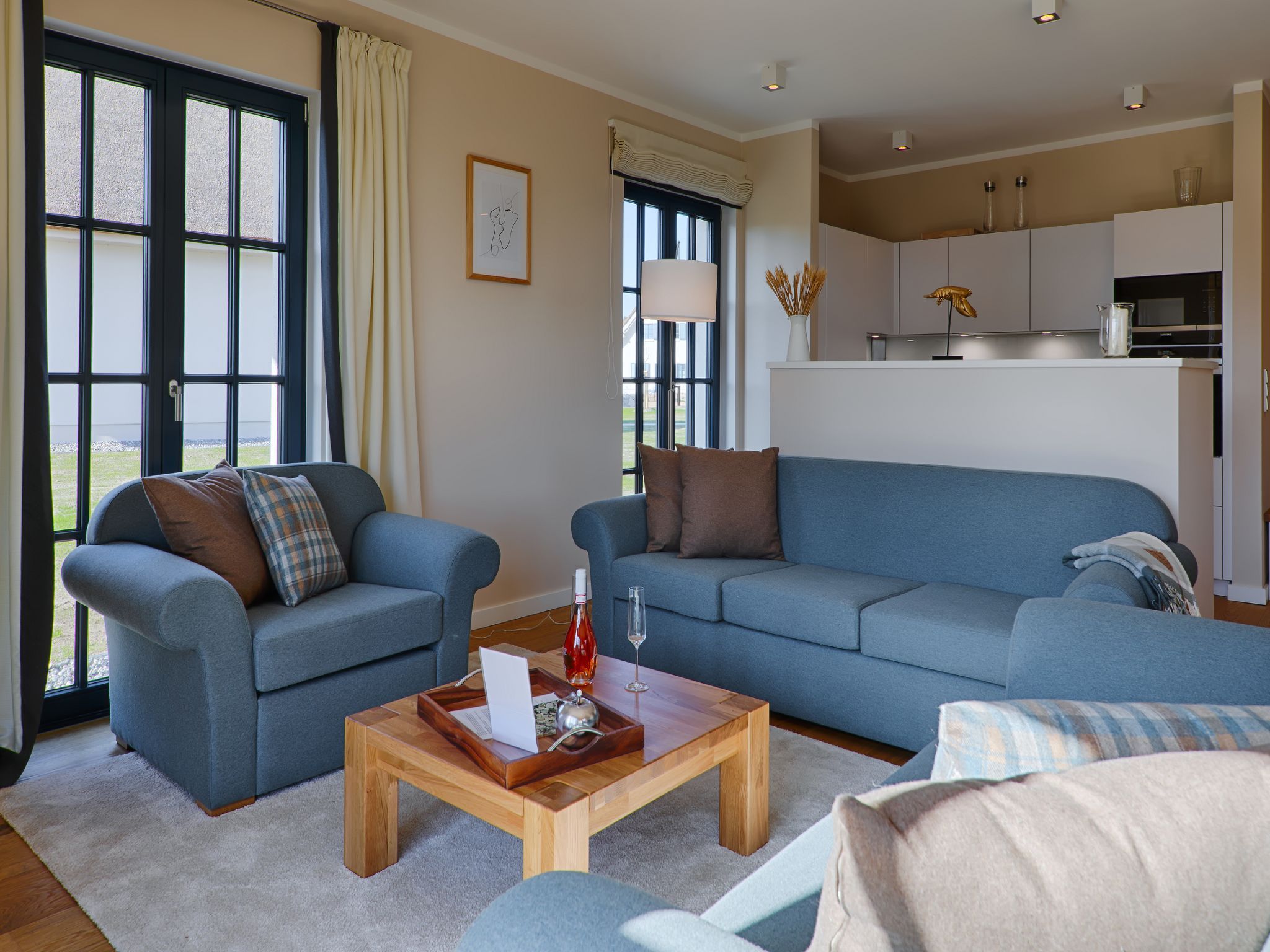 Luxus Reetdachvilla mit 3 Schlafzimmern, Sauna und Kamin (F20) - Wohnzimmer