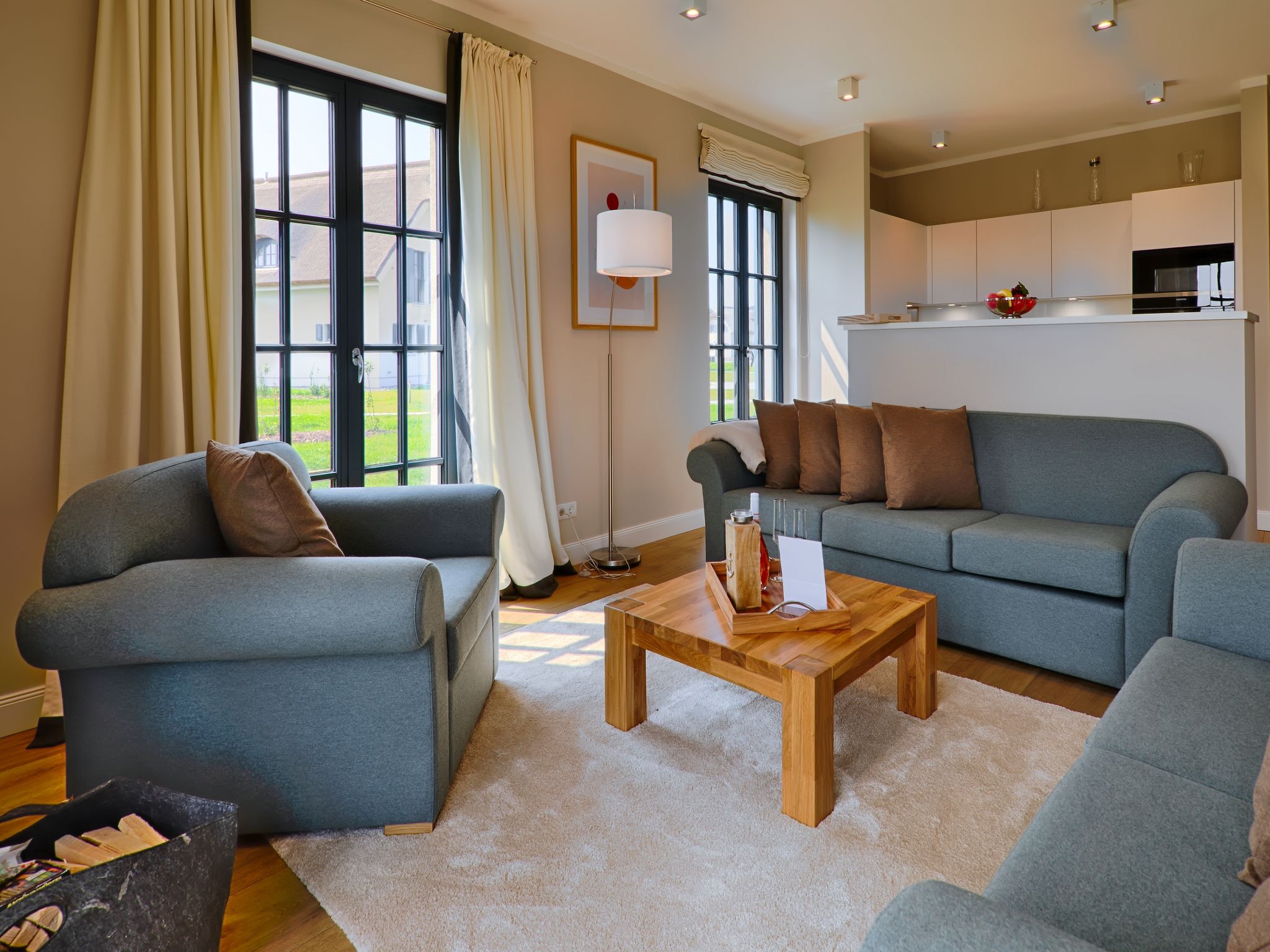 Luxus Reetdachvilla mit 3 Schlafzimmern, Sauna und Kamin (F22) - Wohnzimmer