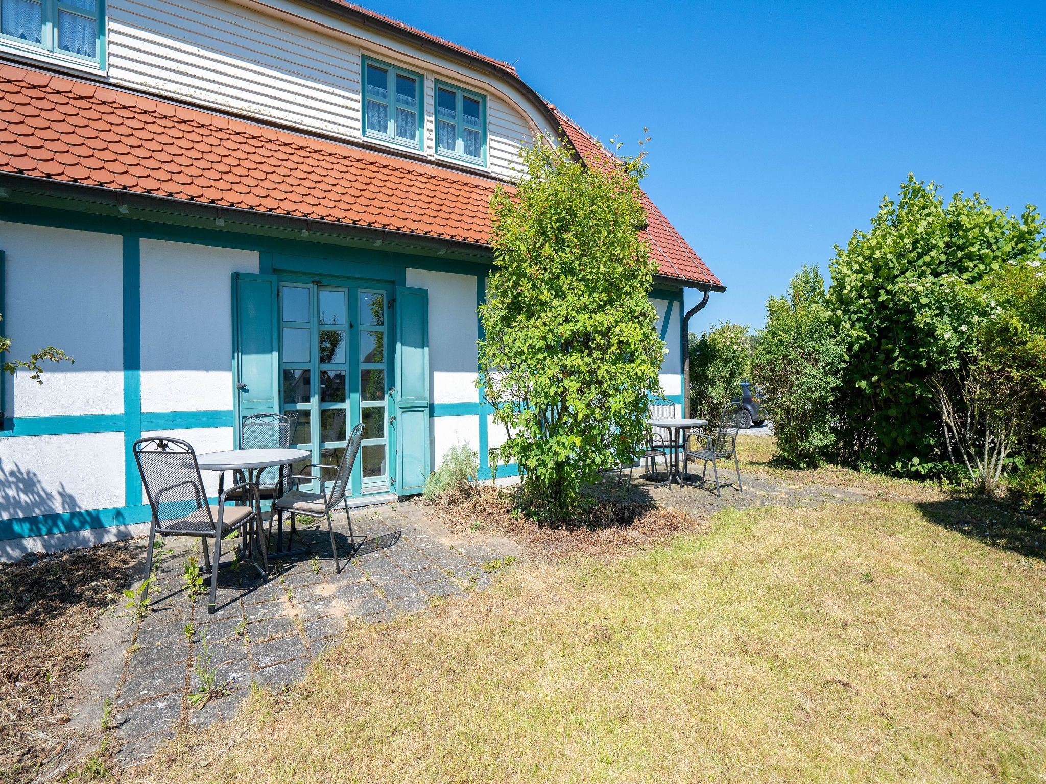 Feriendorf Rugana Klassik Ferienwohnung mit 2 Schlafzimmern und 2 Terrassen (D55) Insel Rügen - Terrasse