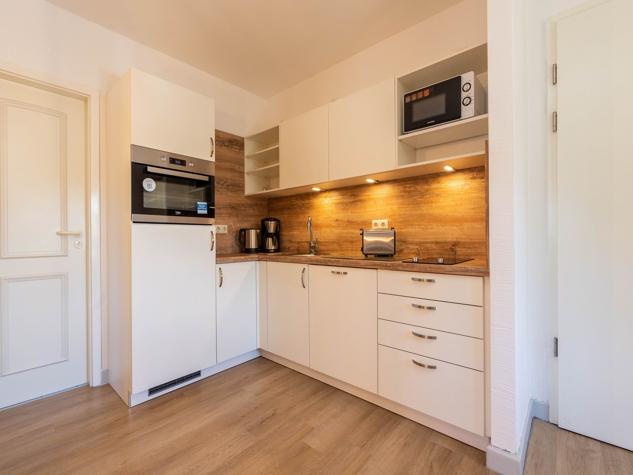 Feriendorf Rugana Komfortplus Ferienwohnung mit 1 Schlafzimmer (A30) Insel Rügen - Küche / Küchenzeile