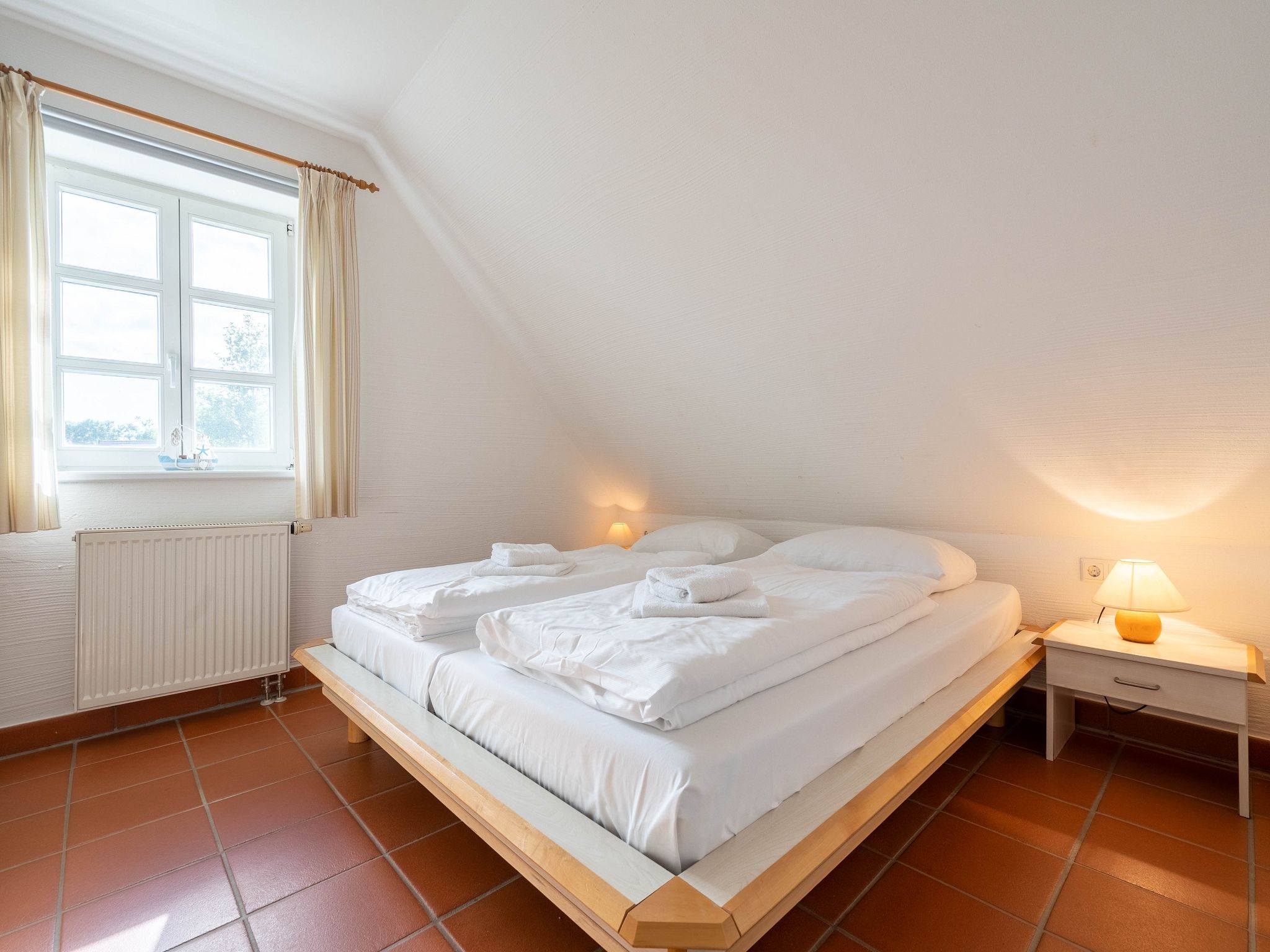 Feriendorf Rugana Moderne Komfort Ferienwohnung mit 1 Schlafzimmer (C02) Insel Rügen - Schlafzimmer