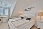 Haus Seesand Penthouse Wohlfühlzeit Scharbeutz - Schlafzimmer