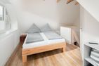  Haus Erika Fewo Süd-Ost Norderney - Schlafzimmer