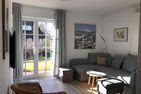 Haus Pesel Ferienwohnung *Reethuk* Norddorf auf Amrum - Wohnzimmer der Ferienwohnung Reethuk in Norddorf auf Amrum