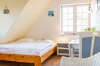  Wattstübchen (Haus Pesel) Norddorf - Doppelbett in der Ferienwohnung Wattstübchen in Norddorf auf Amrum