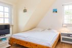  Wattstübchen (Haus Pesel) Norddorf - Doppelbett in der Ferienwohnung Wattstübchen in Norddorf auf Amrum