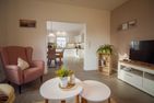  Ferienhaus Rena Krummhörn - Wohnzimmer