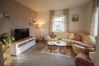  Ferienhaus Rena Krummhörn - Wohnzimmer