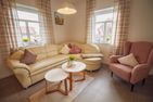  Ferienhaus Rena Krummhörn - Wohnzimmer