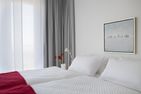 Amrumer Welle Ferienwohnung „Aalto" Wittdün auf Amrum - Doppelbett in der Ferienwohnung Aalto in Wittdün auf Amrum