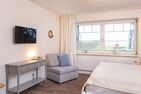  Amrumer Strandhaven Wittdün - Schlafzimmer mit Doppelbett in der Ferienwohnung Amrumer Strandhaven in Wittdün