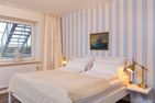  Amrumer Strandhaven Wittdün - Schlafzimmer mit Doppelbett in der Ferienwohnung Amrumer Strandhaven in Wittdün