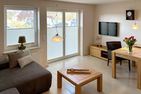  Ferienwohnung *Ose* Wittdün auf Amrum - Wohnzimmer in der Ferienwohnung Ose in Wittdün auf Amrum