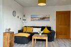 Haus Meeresgruss Strandflieder Loog - Wohnzimmer