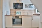 Haus Bergstraße 21 Haus Bergstrasse 21 Appartement 2 Glück Ahoi Timmendorfer Strand - Küche / Küchenzeile