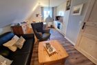  Ferienhaus Ellen, OG Whg.  - Wohnzimmer