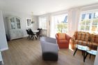 Haus Meeresbrise - Westerstr. 26a, App. 4 Wenningstedt - Wohnzimmer