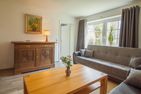  Oma Husen Krummhörn - Wohnzimmer