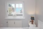 Haus Meeresbrise - Westerstr. 26a, App. 4 Wenningstedt - Schlafzimmer