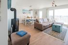  Ferienhaus Meeresmelodie Olpenitz Ostseeresort Olpenitz - Wohnzimmer