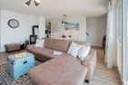  Ferienhaus Meeresmelodie Olpenitz Ostseeresort Olpenitz - Wohnzimmer