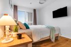  Ferienwohnung Ankerplatz, App. 27 Olpenitz Ostseeresort Olpenitz - Schlafzimmer